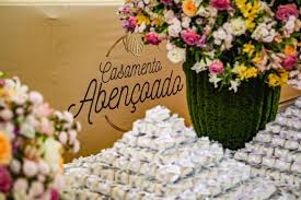 - Casais participando da cerimônia do Casamento Abençoado no Ginásio Aecim Tocantins.