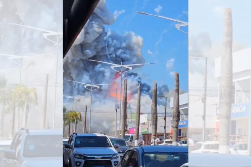 Incêndio em supermercado em Nova Monte Verde com fumaça preta no céu